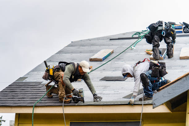 Professional Gutter Installation technician working in Marion, ND